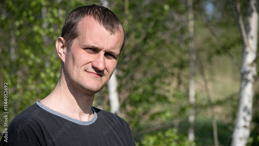 man portrait. the guy against the backdrop of nature. photo, smiling, thoughtful, surprised, indignant, feelings, emotions. fair skin, slight stubble. man 30-40 years old. close-up. European man portrait. the guy against the backdrop of nature. photo, smiling, thoughtful, surprised, indignant, feelings, emotions. fair skin, slight stubble. man 30-40 years old. close-up. European