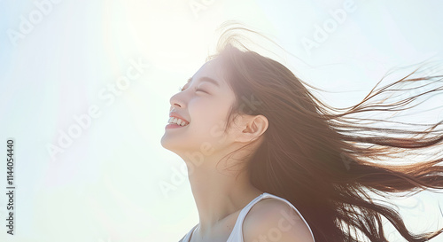 美しいロングヘアがなびくアジア人女性　AI生成画像 photo