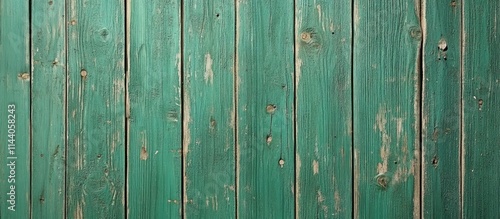 Textured green wooden backdrop ideal for holiday decoration or seasonal themes in photography and design projects. photo