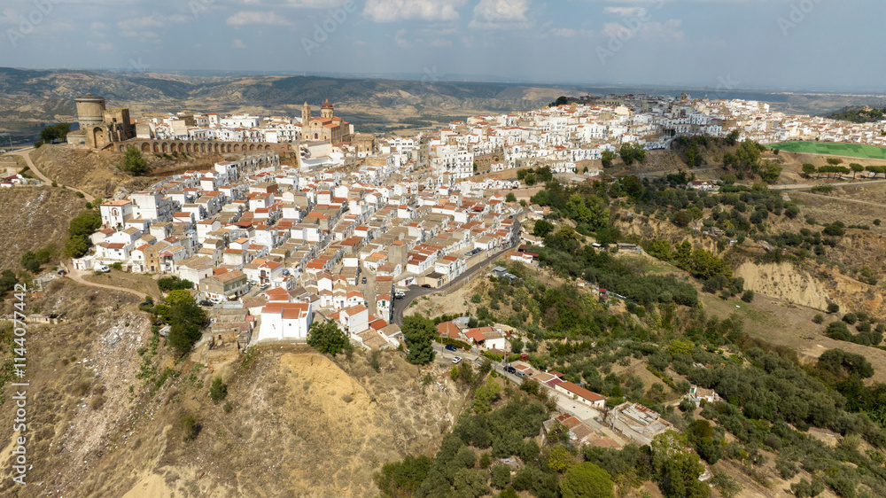 Panoramic aerial view of the city of Pisticci, in the province of Matera, Basilicata. It is a small hill town in southern Italy. Panoramic aerial view of the city of Pisticci, in the province of Matera, Basilicata. It is a small hill town in southern Italy.