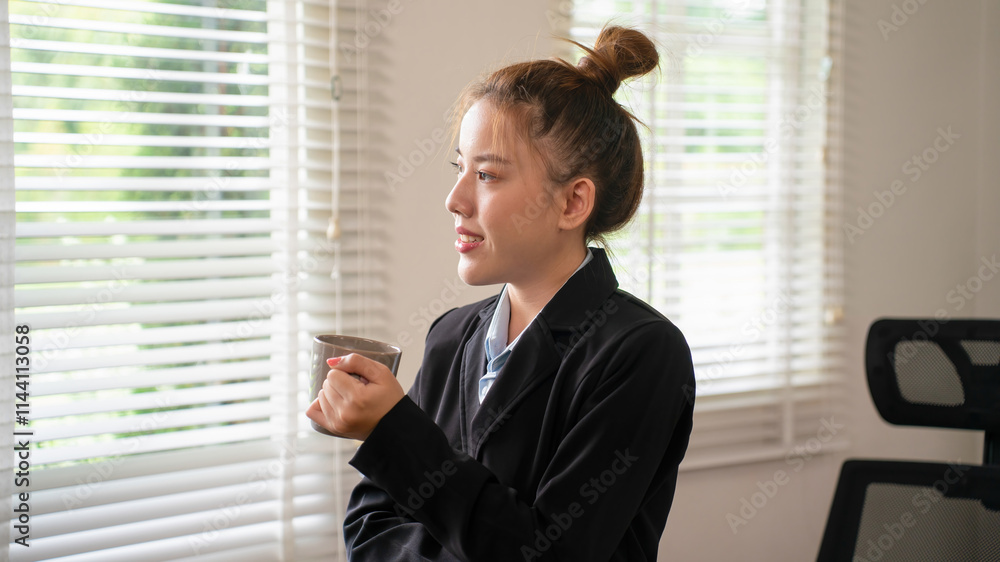 Businesswoman sitting at desk on couch in workplace or at home working on laptop and analyzing data on charts and graphs and writing on papers to make business plan and strategies for company, Businesswoman sitting at desk on couch in workplace or at home working on laptop and analyzing data on charts and graphs and writing on papers to make business plan and strategies for company,