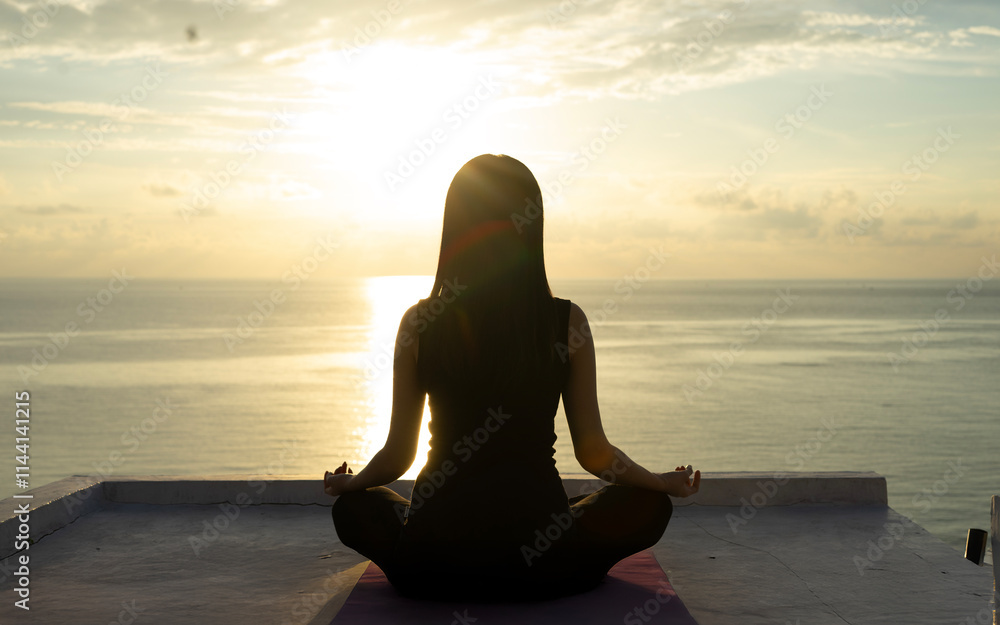 silhouette of a woman meditating on the beach silhouette of a woman meditating on the beach