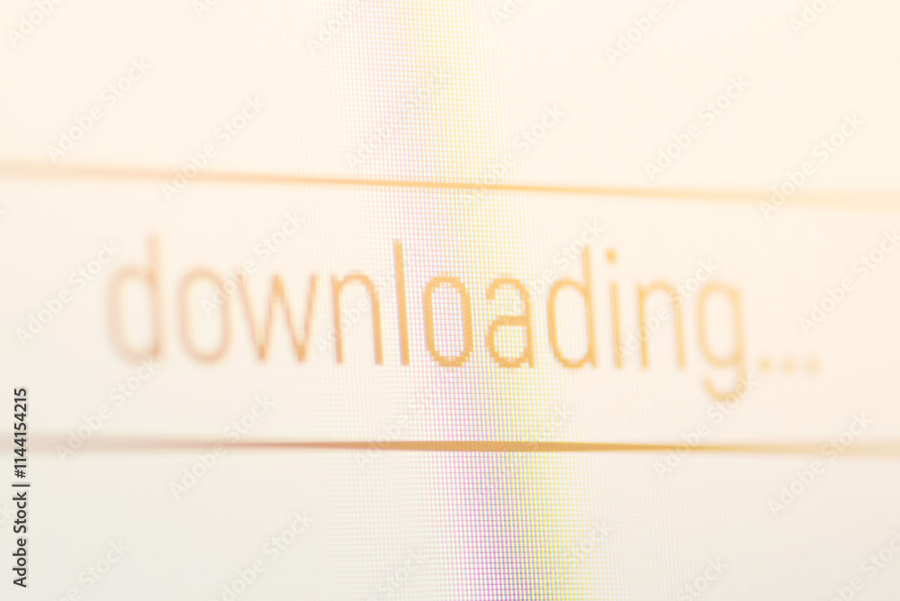 Fototapeta premium Downloading icon on computer screen. Concept of downloading files from the Internet to personal computer