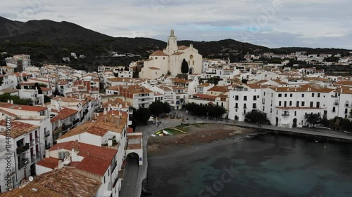 Cadaques fishing harbor drone view in Spain. White town in Alt Emporda county of Catalonia, Spain.