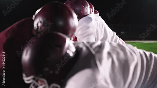 American Football Championship Start Teams Ready: Professional Players, Aggressive Face-off, Start Pushing, Tackling. Competition Full of Brutal Energy, Skill. Cinematic Slow Motion. Dramatic Sport