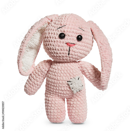 Toy bunny. Pink knitted bunny in amigurumi style isolated on white background. Sad soft toy.