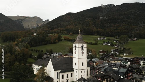 Wallpaper Mural Aerial drone shot Saint Wolfgang im Salzkammergut on a cloudy and foggy day by dark green mountains Torontodigital.ca