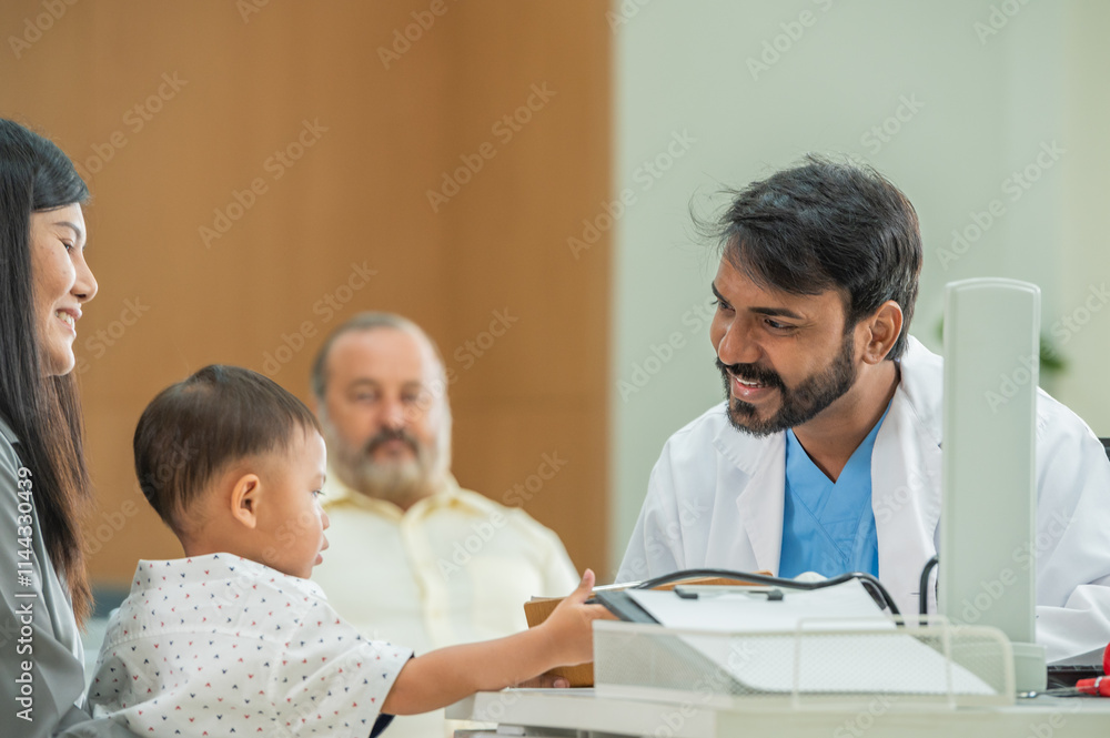 The doctor is checking the little boy's blood pressure while the mother looks on. The doctor is checking the little boy's blood pressure while the mother looks on.