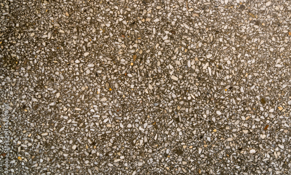 A polished concrete texture for use as a background in graphics. A polished concrete texture for use as a background in graphics.