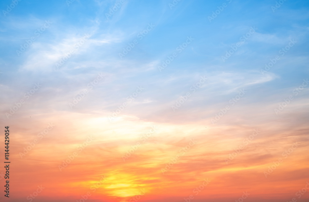 Sky,sunset, beautiful , luxury soft gradient orange gold clouds and sunlight on the blue sky perfect for the background, Sunrise on morning or everning in winter warm time ,Twilight summer,silhouette Sky,sunset, beautiful , luxury soft gradient orange gold clouds and sunlight on the blue sky perfect for the background, Sunrise on morning or everning in winter warm time ,Twilight summer,silhouette