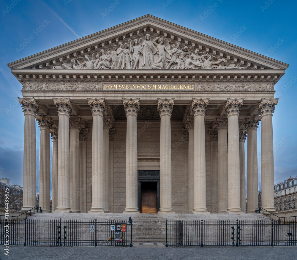Fototapeta premium Paris, France - 12 18 2024: View the facade of the Church of the Madeleine renovated.