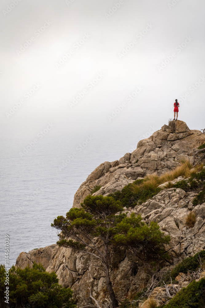 Person on top of a Rock in Spain