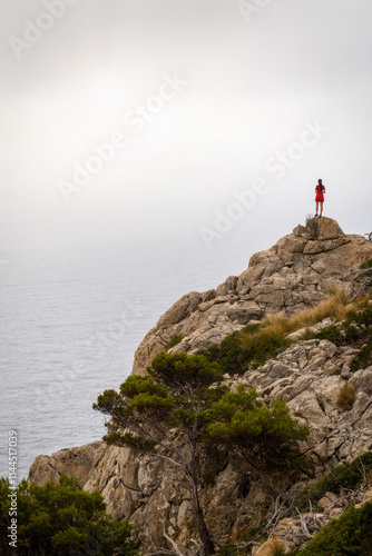 Obraz na płótnie Person on top of a Rock in Spain w salonie