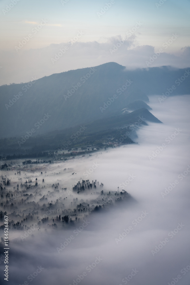 Low Clouds rolling in over mountain ridge
