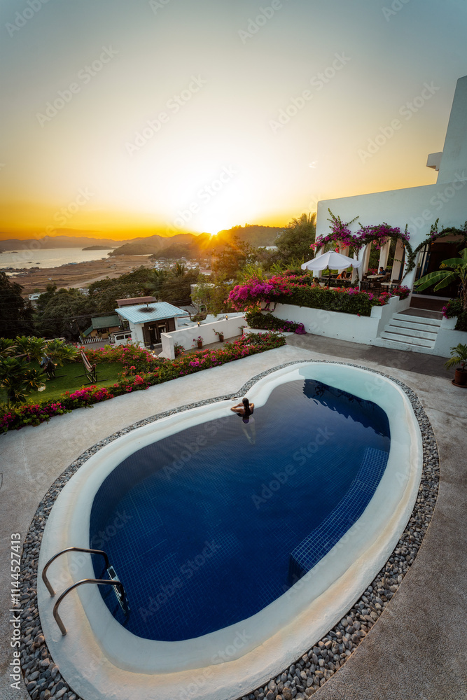 Luxury Pool Overlooking the Ocean during Sunset
