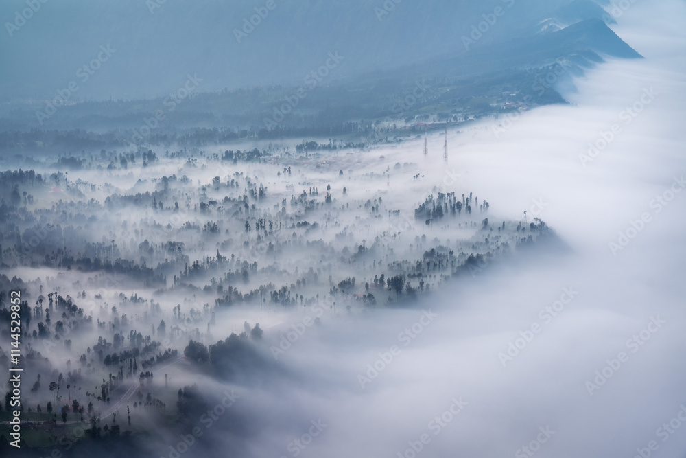 Low Clouds rolling in over mountain ridge
