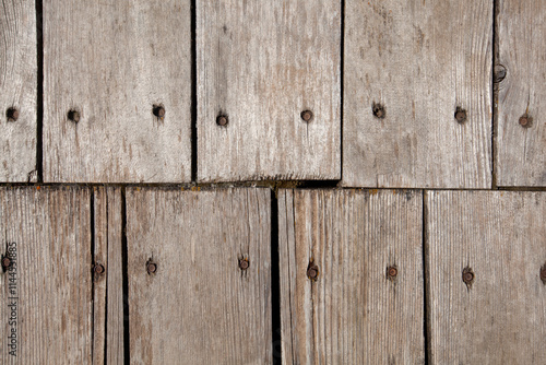 Old wooden boards with rusty nails