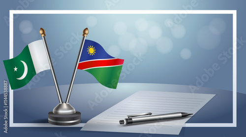 Pakistan and Namibia National flags on small table with bokeh background, cooperative relationship