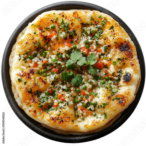 Top view of an extremely perfect looking rice bhakri in a dark stone plate isolated on a white transparent background photo