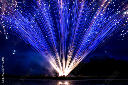 Spectacular Lakeside Blue Firework Fan Burst photo