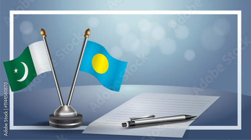 Pakistan and Palau National flags on small table with bokeh background, cooperative relationship