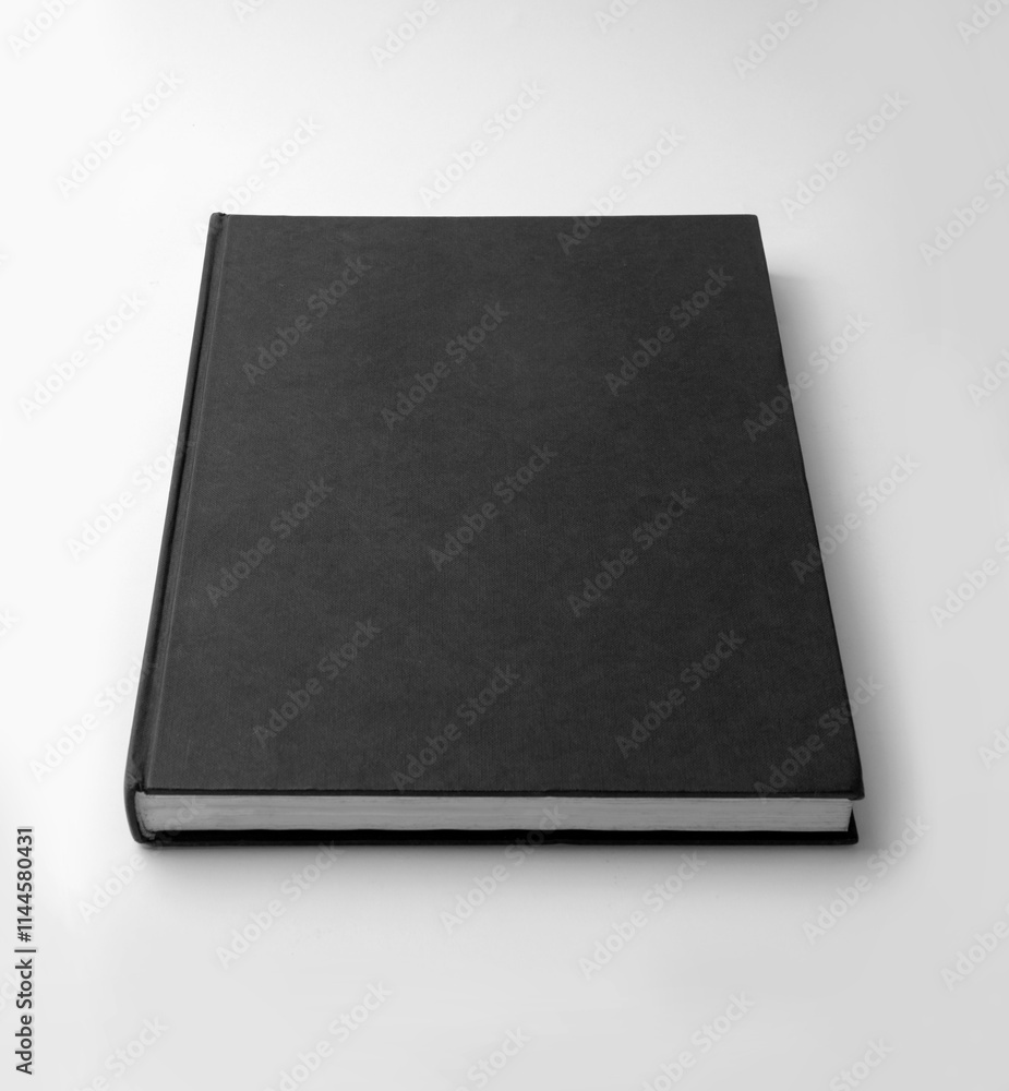 Blank black vertical book cover isolated on white paper background. Blank black vertical book cover isolated on white paper background.