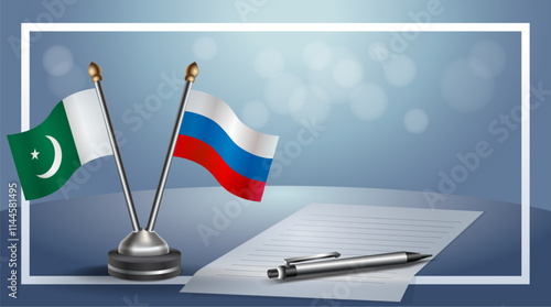 Pakistan and Russian Federation National flags on small table with bokeh background, cooperative relationship