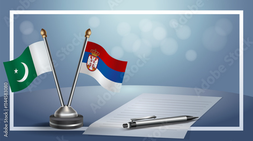 Pakistan and Serbia National flags on small table with bokeh background, cooperative relationship