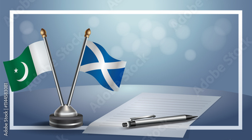 Pakistan and Scotland National flags on small table with bokeh background, cooperative relationship
