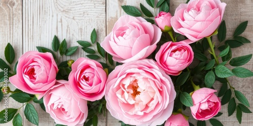 Fototapeta Naklejka Na Ścianę i Meble -  Vintage style artificial flowers wall background with pink roses, peonies, and greenery, pink roses, rustic aesthetic, peonies