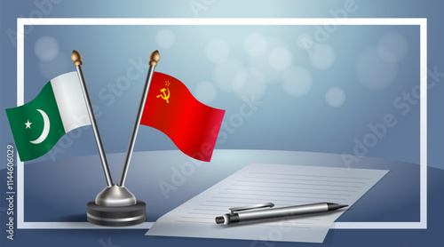 Pakistan and USSR National flags on small table with bokeh background, cooperative relationship