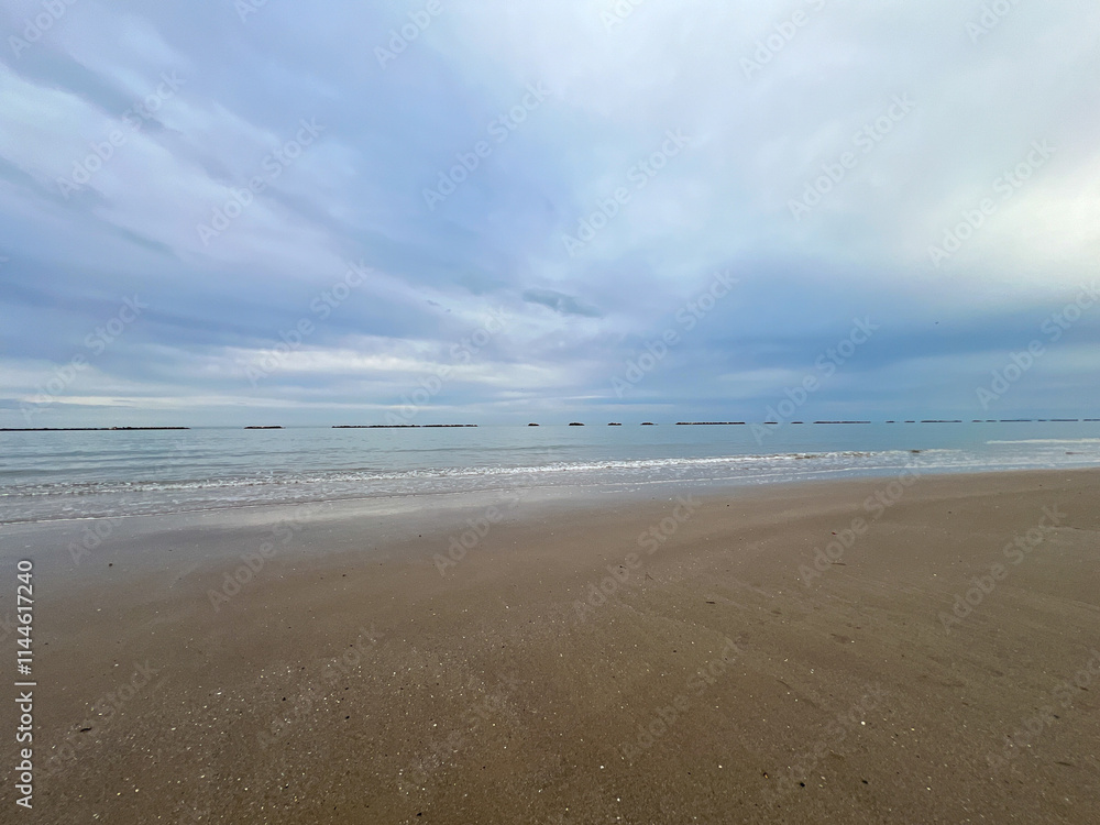 rimini beach in the early morning with beautiful sky in winter time rimini beach in the early morning with beautiful sky in winter time