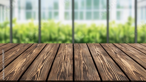 Wooden table surface with blurred greenery background for display