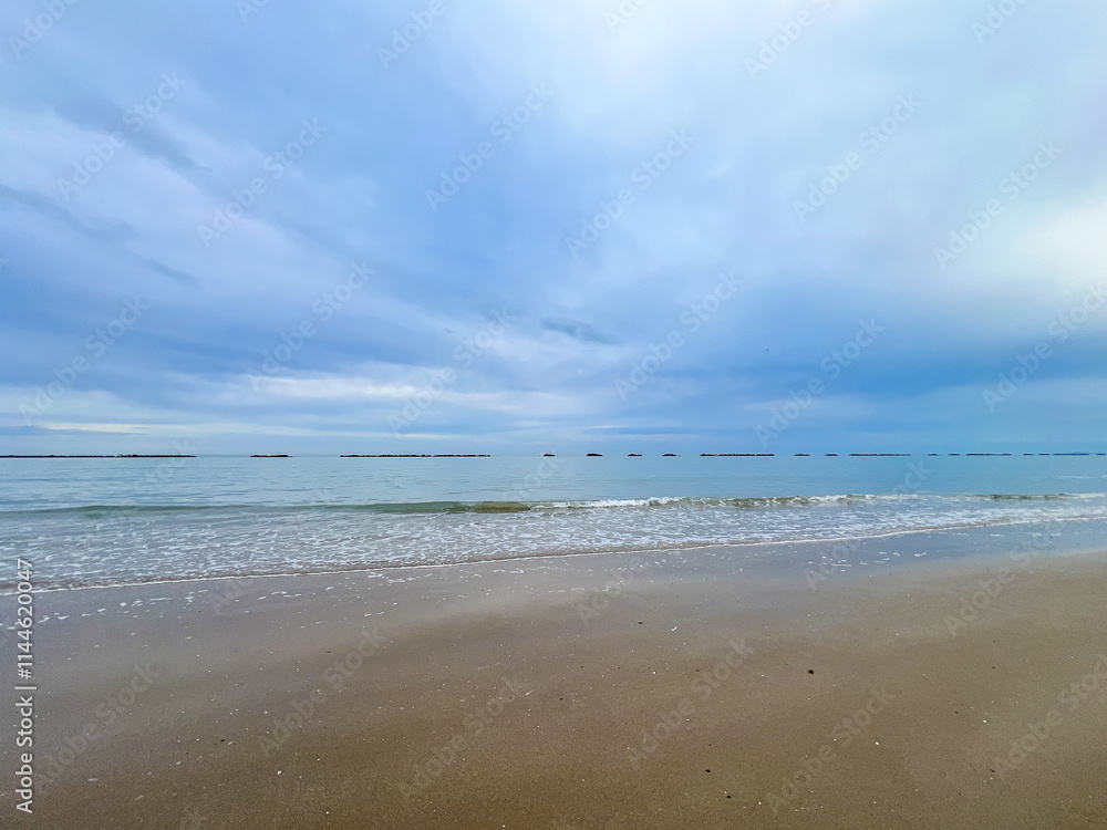 rimini beach in the early morning with beautiful sky in winter time rimini beach in the early morning with beautiful sky in winter time