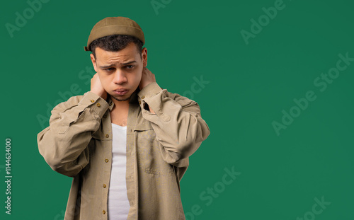 Worried man doing panic despair gesture, like no, I forgot. Disappointed guy feeling sorrow photo