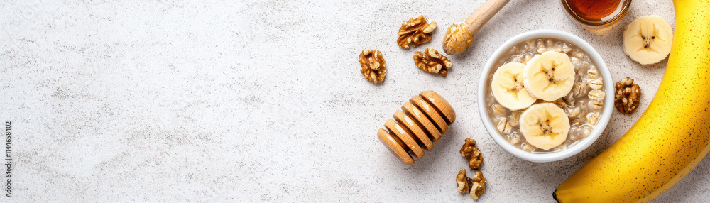 Fresh and wholesome breakfast scene featuring oatmeal, banana, honey, and walnuts, perfect for healthy start to day Fresh and wholesome breakfast scene featuring oatmeal, banana, honey, and walnuts, perfect for healthy start to day