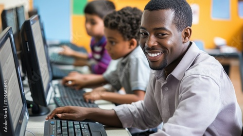 Teacher helping school kids using personal computers during computer science class photo