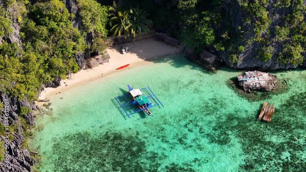 Stunning aerial shot of Barracuda Lake in Coron, showcasing its unique mix of freshwater and saltwater. Stunning aerial shot of Barracuda Lake in Coron, showcasing its unique mix of freshwater and saltwater.