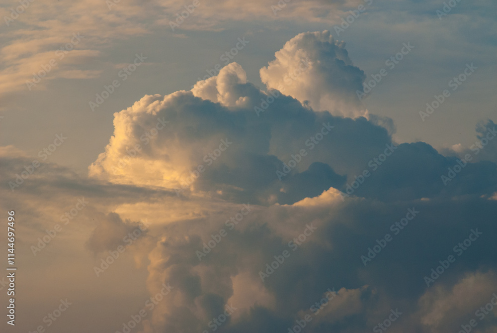 Huge cloud at sunset against the sky. Huge cloud at sunset against the sky.