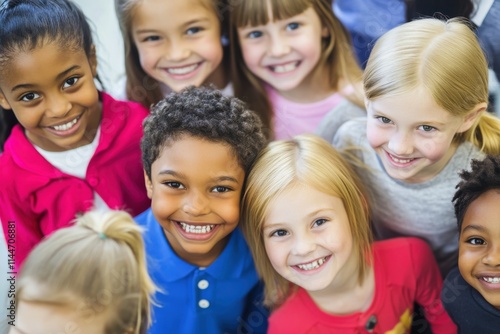 Group of joyful children smiling together in a classroom during a cheerful learning activity on a sunny day