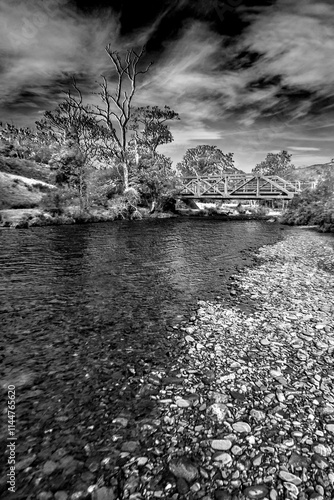 The landscape along the River Glaslyn (Aflon Glaslyn) in Eryri National Park in Wales in black and white