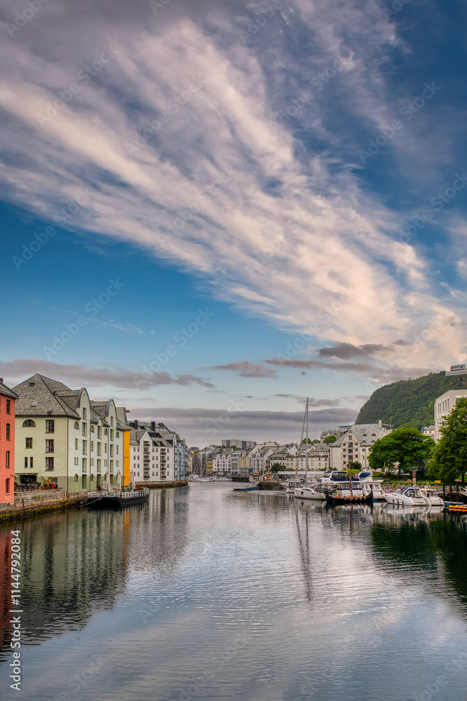 Fototapeta premium Alesund is a city and municipality in Møre og Romsdal county, Norway. It is a port 236 km northeast of Bergen