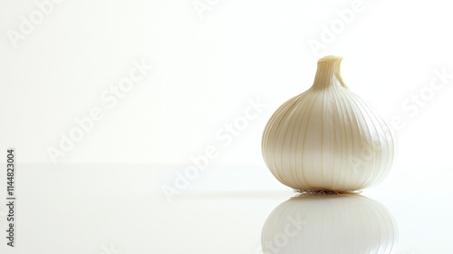 Fennel bulb resting on a white background, reflecting its distinct shape and texture. This image of fennel bulb allows for copy space to enhance designs or presentations. photo