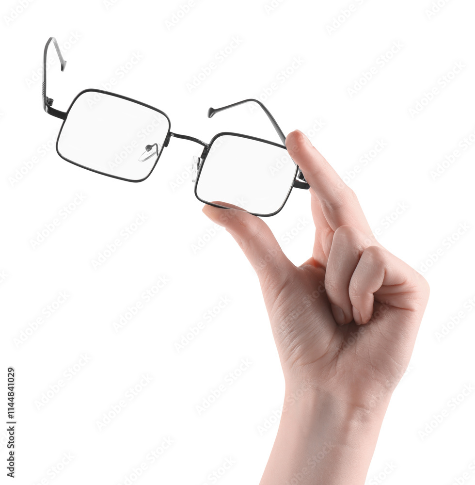 Woman holding glasses with black metal frame on white background, closeup Woman holding glasses with black metal frame on white background, closeup