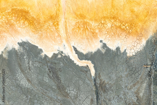 Multicolored mud texture with earthy tones and natural patterns