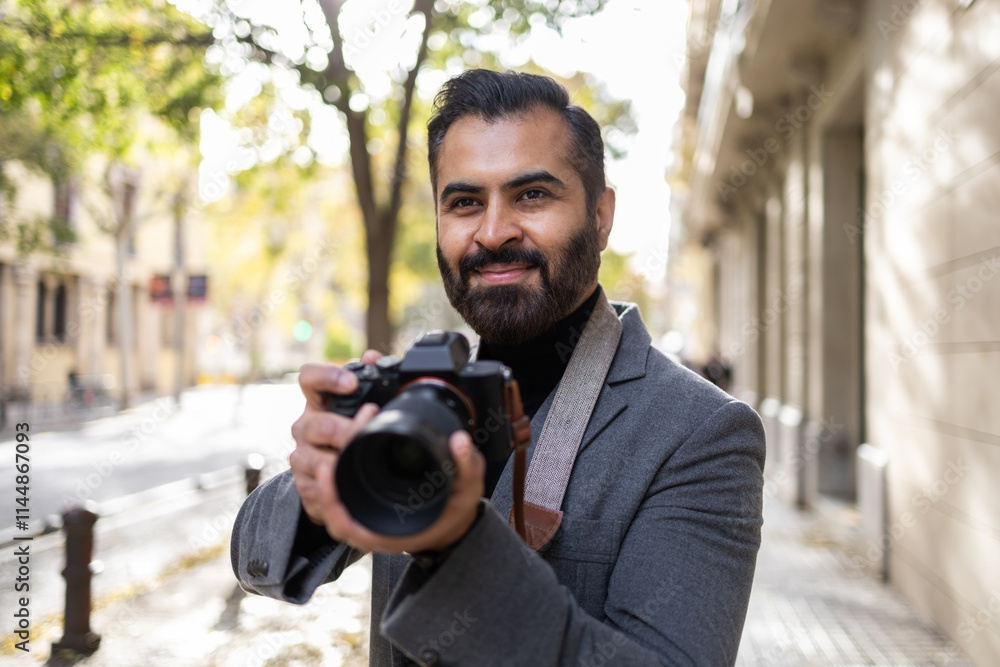 Indian photographer capturing moments in urban setting Indian photographer capturing moments in urban setting