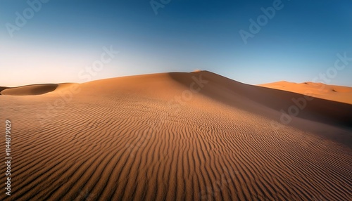 Serene desert landscape with gentle sand dunes.