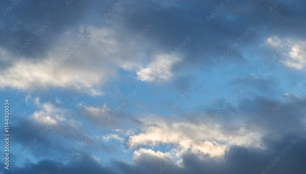 Fototapeta premium Beautiful tender sunrise sky with clouds. Sky background.