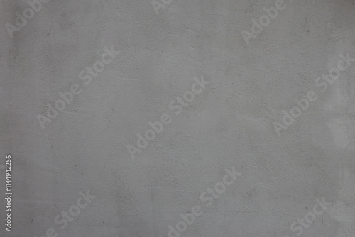 Abstract background of old gray plaster close-up.