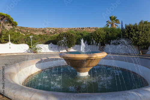 Kalithea, Greece, September 29, 2023 - Seaside landscape. Kalithea Therme Observator spa. Beautiful buildings built in the 1930s, Kallithea bay photo